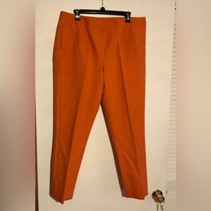 Preowned orange khaki slacks by NORDSTROM is in great condition in size 14